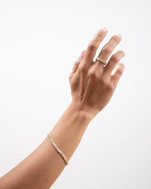 Tennis - emerald bezel bracelet
