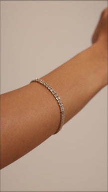 Tennis - emerald bezel bracelet